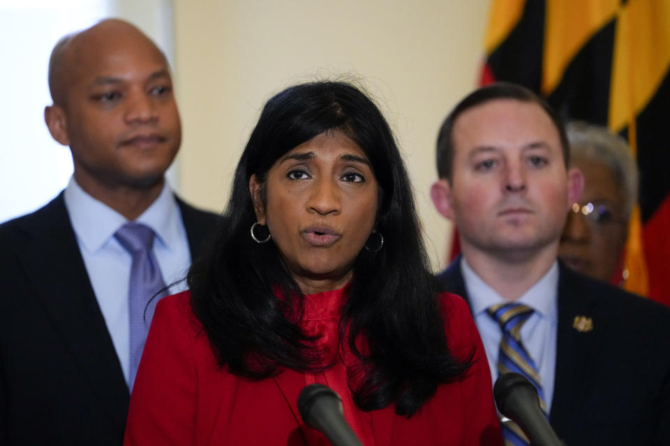 Maryland Lt. Gov. Aruna Miller, center, speaks during a news conference in front of Gov. Wes Moore, left, and state Senate President Bill Ferguson, D-Baltimore, right, at the statehouse, Thursday, Feb. 9, 2023, in Annapolis, Md. State lawmakers announced support for measures protecting abortion rights, including a state constitutional amendment that would enshrine it. (AP Photo/Julio Cortez)