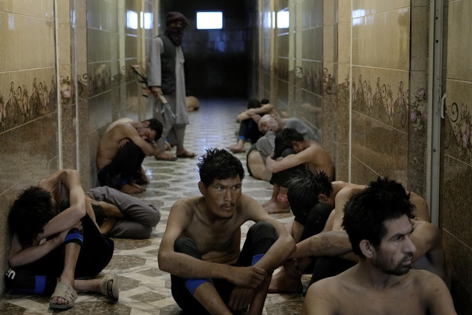 Drug addicts detained during a Taliban raid wait to have a shower in a drug addiction treatment camp in Kabul, Afghanistan, Tuesday, May 31, 2022. Drug addiction has long been a problem in Afghanistan, the world’s biggest producer of opium and heroin. The ranks of the addicted have been fueled by persistent poverty and by decades of war that left few families unscarred. (AP Photo/Ebrahim Noroozi)