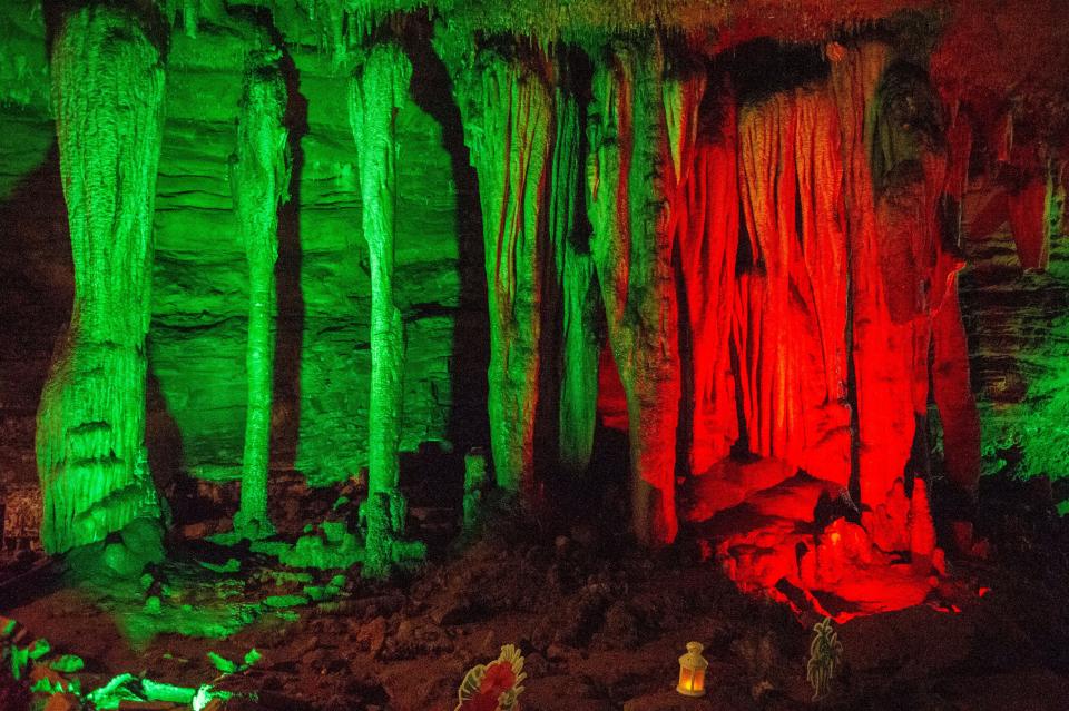 Rock formation light up with decorative lighting during the second annual Christmas in July at the Historic Cherokee Caverns in Knoxville, Tenn. on Saturday, July 23, 2022.