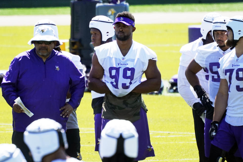 Minnesota Vikings defensive end Danielle Hunter (99) watches during NFL football minicamp practice Tuesday, June 15, 2021, in Eagan, Minn. Hunter just signed a re-worked contract. (AP Photo/Jim Mone)