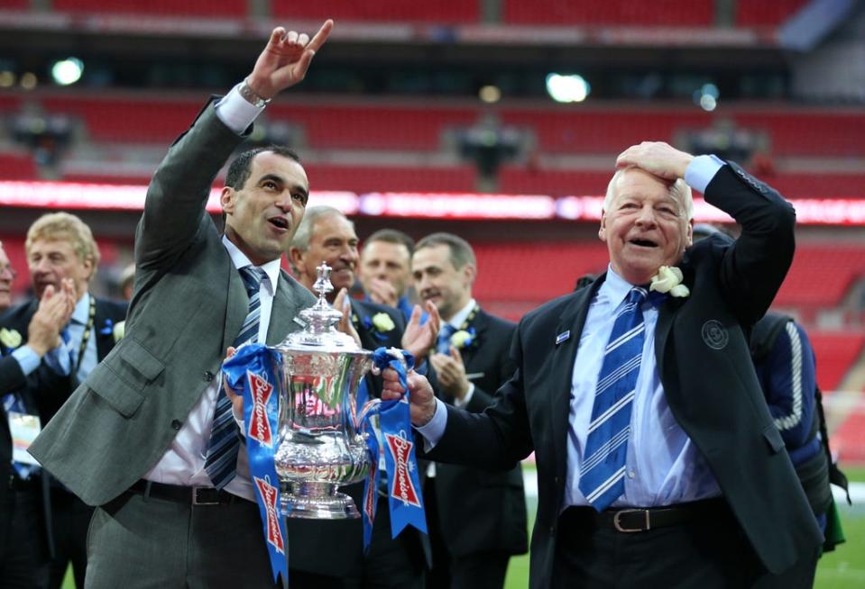 Wigan manager Roberto Martinez (left) and chairman Dave Whelan celebrate an unlikely FA Cup final victory over Manchester City (Anthony Devlin/PA) (PA Archive)