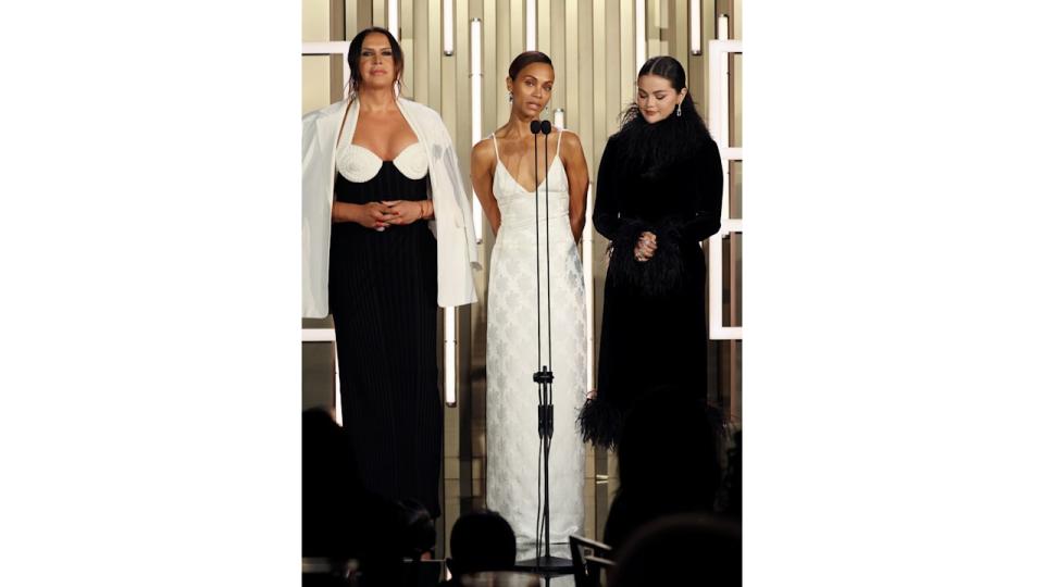 Karla Sofia Gascon,  Zoe Saldana, and Selena Gomez speak onstage during the TIFF Tribute Awards during the 2024 Toronto International Film Festival at Fairmont Royal York on September 08, 2024 in Toronto, Ontario. (Photo by Jemal Countess/Getty Images)