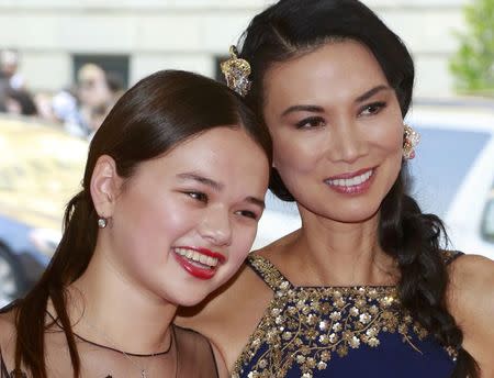 Wendi Deng Murdoch (R) and daughter Grace Helen Murdoch arrive for the Metropolitan Museum of Art Costume Institute Gala 2015 celebrating the opening of "China: Through the Looking Glass," in Manhattan, New York May 4, 2015. REUTERS/Andrew Kelly