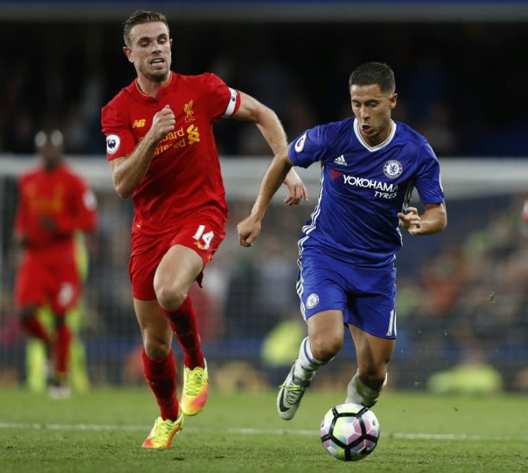 Jordan Henderson (left) challenges Eden Hazard during Liverpool's match against Chelsea at Stamford Bridge on September 16, 2016