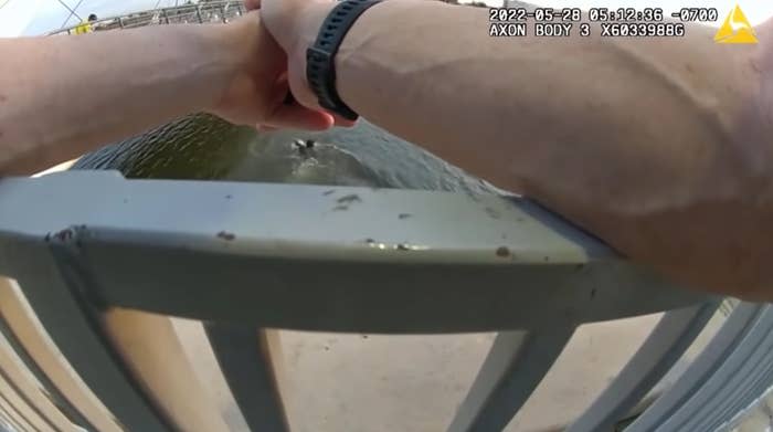 Body-worn camera footage shows Bickings attempting to swim in Tempe Town Lake before drowning as an officer watches on May 28, 2022.