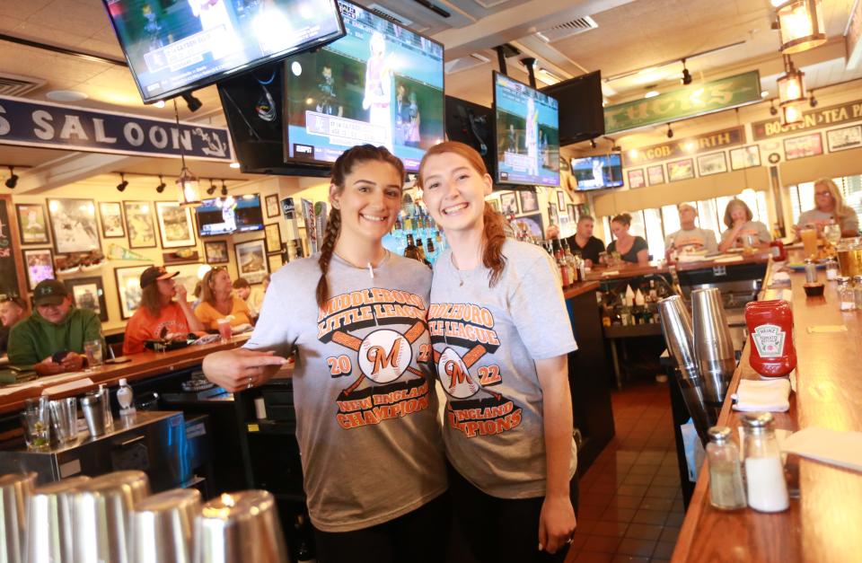 Boston Tavern bartenders Amber Greaves and Christianna Allen behind the bar on Wednesday, Aug. 17, 2022 during a watch party for the opening game of the Little League World Series for the Middleboro U12 All Stars. Middleboro, representing New England, played Nolensville, Tennessee out of the Southeast. 