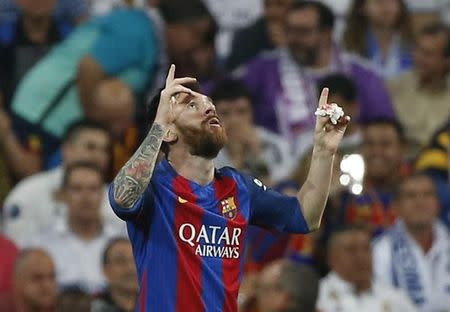 Football Soccer - Real Madrid v FC Barcelona - Spanish Liga Santander - Santiago Bernabeu, Madrid, Spain - 23/4/17 Barcelona's Lionel Messi celebrates scoring their first goal Reuters / Susana Vera Livepic