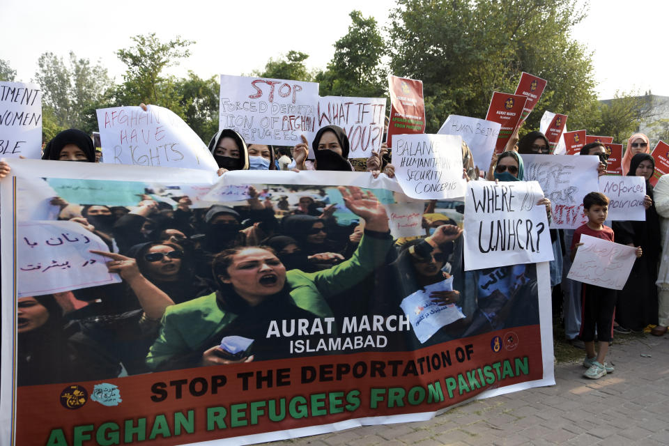 A social group, Aurat March, hold signs during a demonstration against Pakistani government, in Islamabad, Pakistan, Sunday, Oct. 29, 2023. Pakistan says it has recently announced plans to deport all migrants who are in the country illegally, including 1.7 million Afghans, who will be implemented in a "phased and orderly manner." (AP Photo/W.K. Yousafzai)