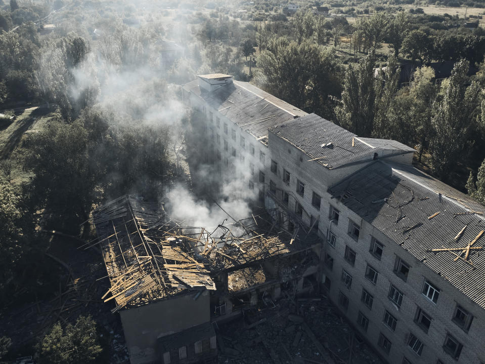 Ruins of a psychiatric hospital are seen after the Russian night shelling in Kramatorsk, Donetsk region, eastern Ukraine, in the early hours of Wednesday, Aug. 7, 2022. (AP Photo/Kostiantyn Liberov)