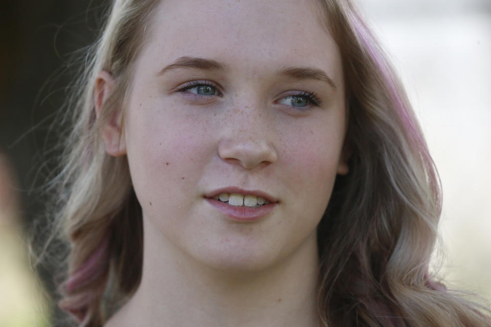 High school student Brianne Harmon is shown Monday, Aug. 10, 2020, in Magna, Utah. Harmon, 16, struggled at the end of last school year as she tried to find a quiet place to work in a remote school in a house with several relatives. She was in danger of failing three classes but after a series of sleepless nights, she managed to catch up, allowing her to continue with the drill team, a sport she loves. (AP Photo/Rick Bowmer)