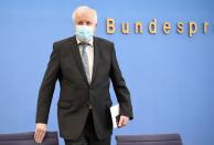 German Interior Minister Horst Seehofer attends a news conference, in Berlin