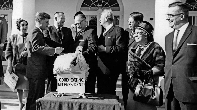 John F. Kennedy granting pardon to gifted turkey