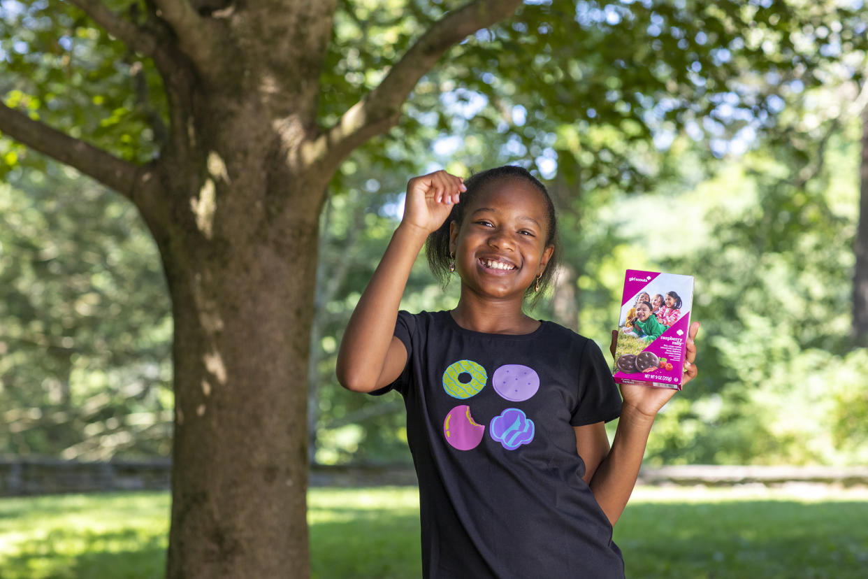 I danced like this little girl while eating those Raspberry Rally cookies.
 (Girl Scouts of the USA)