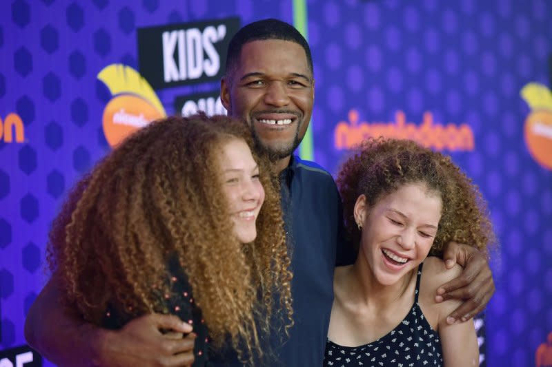 Michael Strahan and his daughters Isabella and Sophia attend the Nickelodeon's Kids' Choice Sports Awards in 2018. File Photo by Chris Chew/UPI
