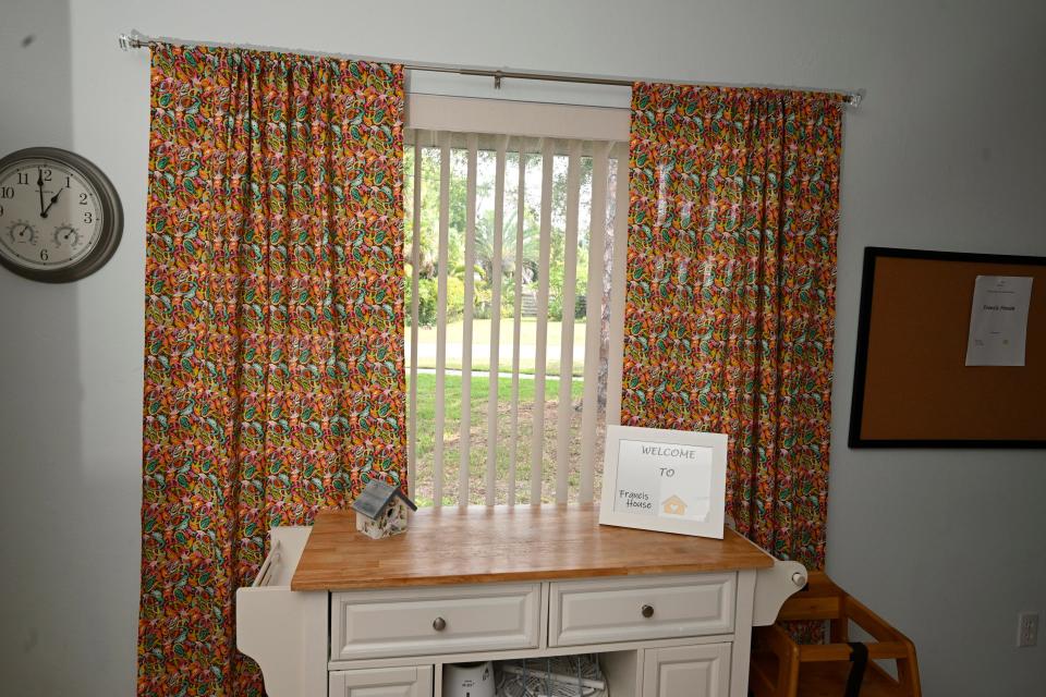 Sue Bridgeman welcomed Francis House to the neighborhood by making these living room curtains as well as other curtains in the three-bedroom house.