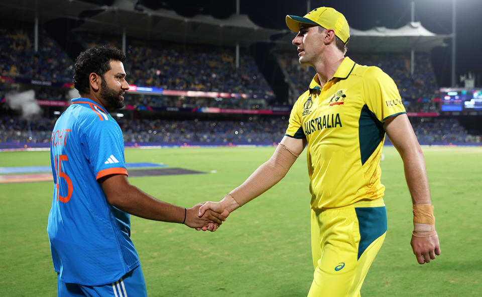 Rohit Sharma and Pat Cummins, pictured here after Australia's loss to India at the Cricket World Cup.