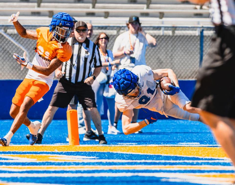Boise State wide receiver Austin Bolt catches a 39-yard touchdown pass Saturday during the Broncos’ second live scrimmage of spring practice.
