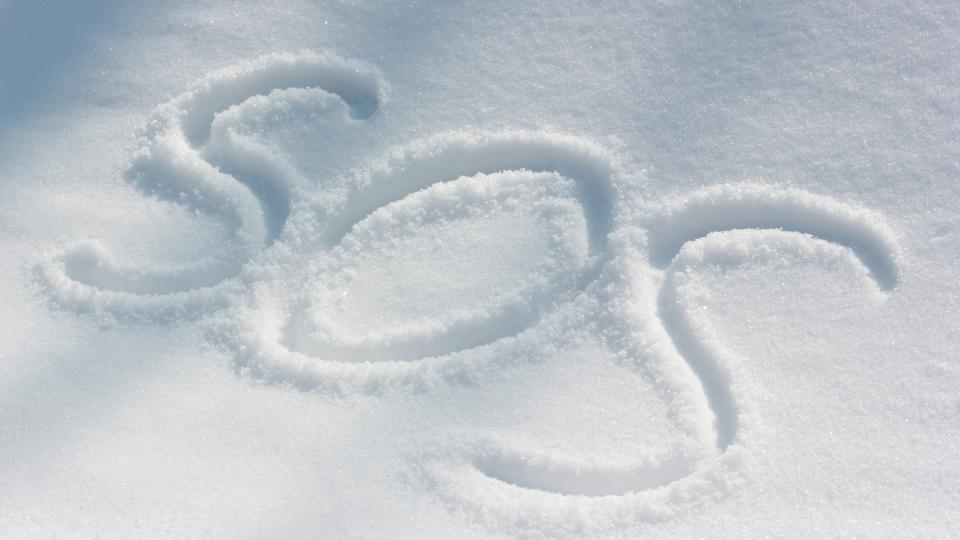 SOS written in the snow