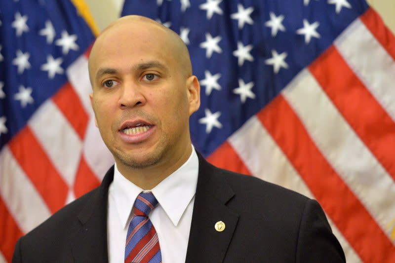 On December 4, 2012, Newark, N.J., Mayor Cory Booker, responding to a challenge to survive on food stamps, began a week of spending less than $5 a day on food -- posting his grocery receipts on Facebook and Twitter. "This is hard," said Booker, who became a U.S. senator in 2013. File Photo by Kevin Dietsch/UPI