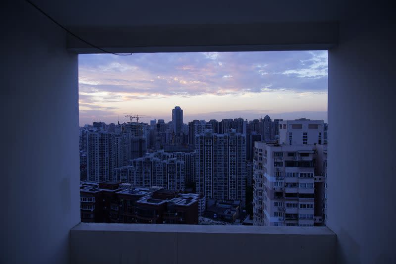 Buildings of residential compounds are seen in Shanghai