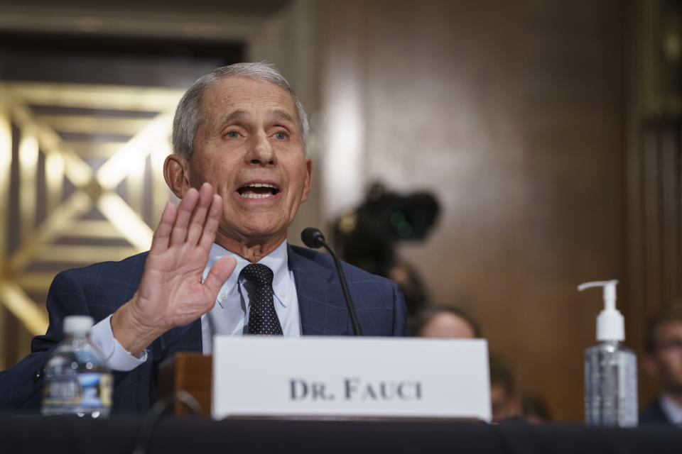 Top infectious disease expert Dr. Anthony Fauci pushes back on statements by Sen. Rand Paul, R-Ky., as he testifies before the Senate Health, Education, Labor, and Pensions Committee on Capitol Hill in Washington, Tuesday, July 20, 2021. Cases of COVID-19 have tripled over the past three weeks, and hospitalizations and deaths are rising among unvaccinated people. (AP Photo/J. Scott Applewhite, Pool)