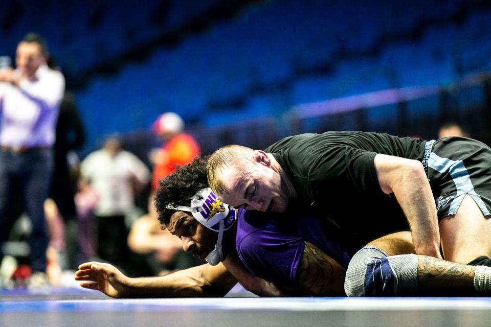 Northern Iowa's Parker Keckeisen, top, wrestles teammate Tyrell Gordon during the practice session of the NCAA Division I Wrestling Championships, Wednesday, March 15, 2023, at BOK Center in Tulsa, Okla.