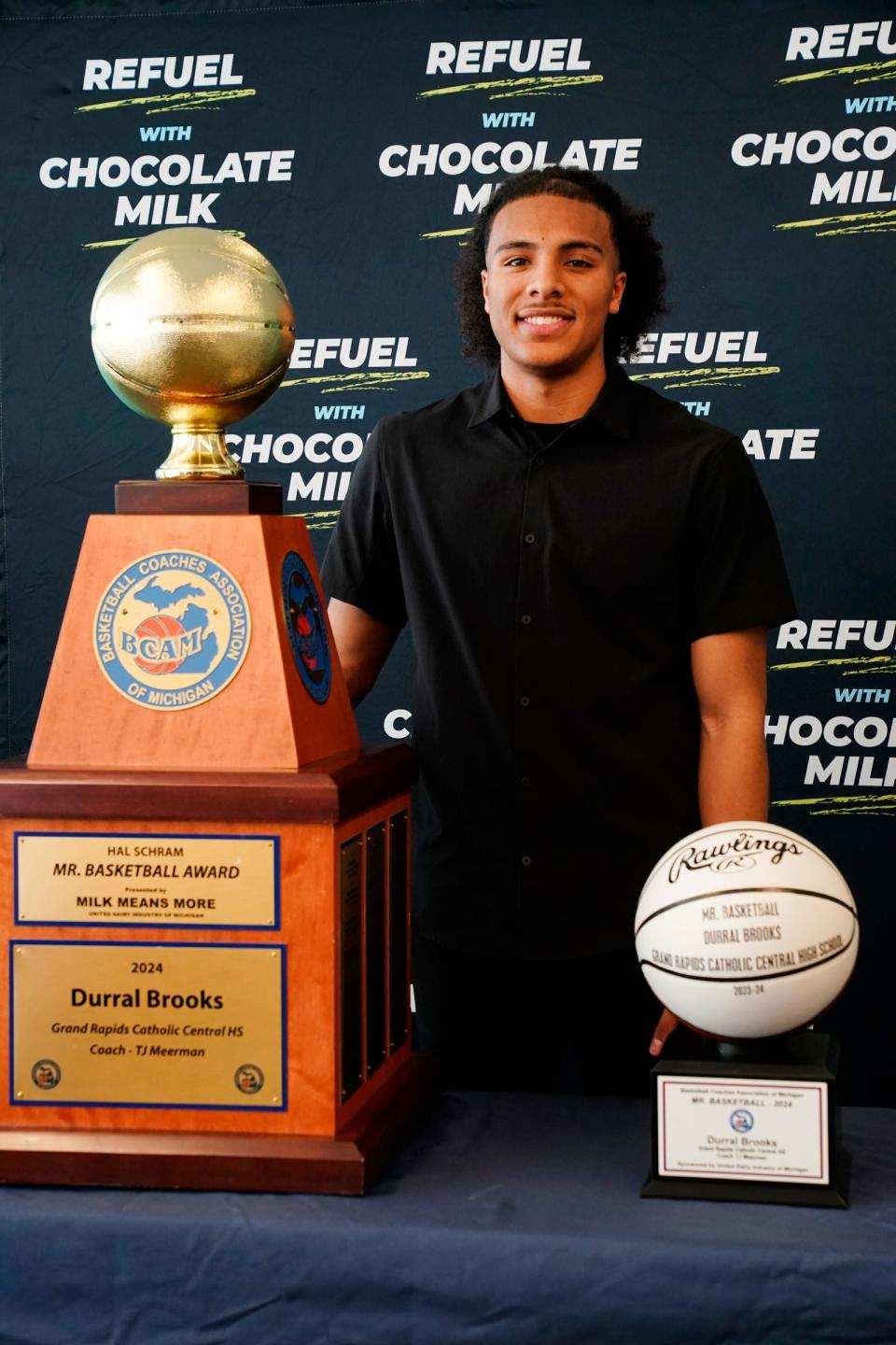 Grand Rapids Catholic Central's Durral Brooks accepts the 2024 Hal Schram Mr. Basketball award at the Detroit Free Press on Monday, March 11, 2024.