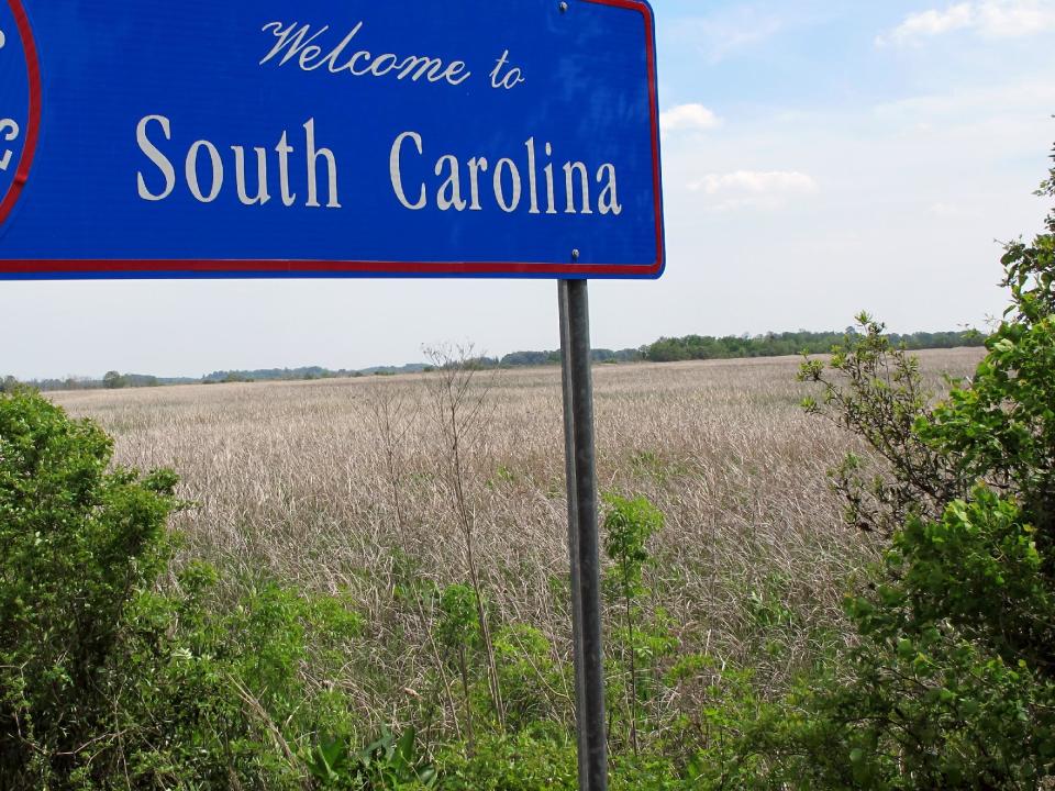 In this March, 29, 2012 photo, the Savannah National Wildlife Refuge reaches toward the Savannah River at the South Carolina-Georgia state line outside Hardeeville, S.C. Conservation groups have sued saying dredging the river to accommodate larger ships at Georgia's ports requires a South Carolina pollution permit because toxic chemicals in silt will be dumped on the South Carolina side. The U.S. Army Corps of Engineers asked a judge this week to toss out the lawsuit.( AP Photo/Bruce Smith)