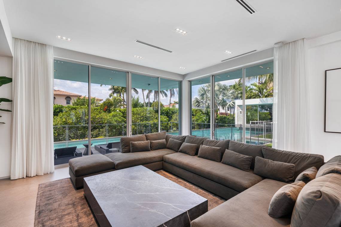 The house ex-Miami Heat player Victor Oladipo sold has seven bedrooms and seven bathrooms. The living room in this photo has views of the pool in the backyard.
