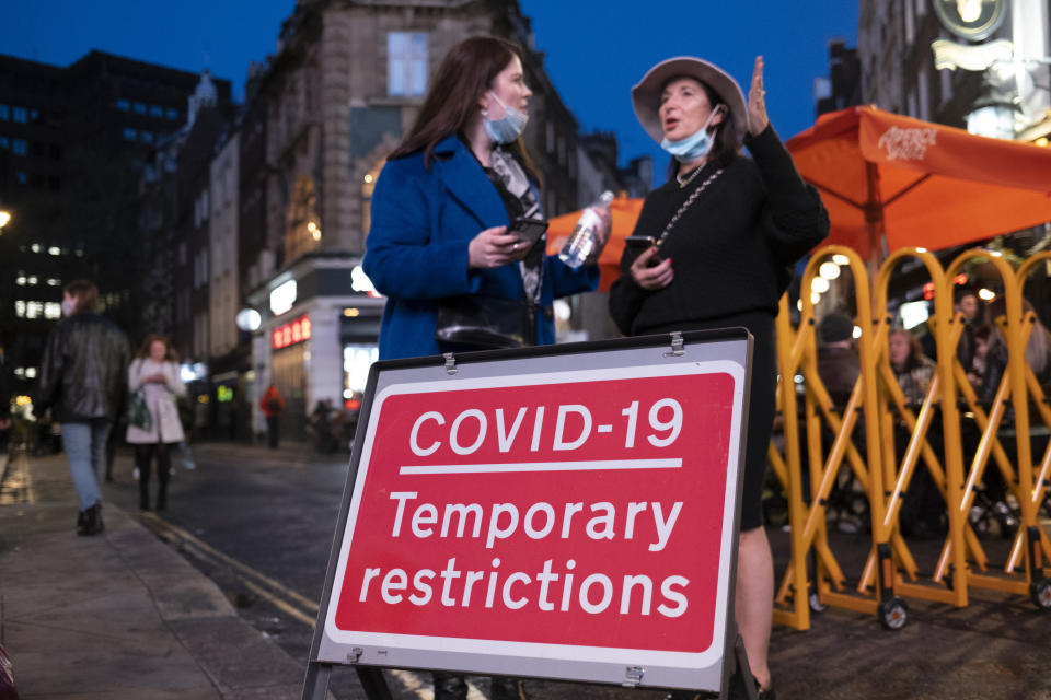 People seen on the West End, ahead of the announcement of the UK going back into lockdown. 