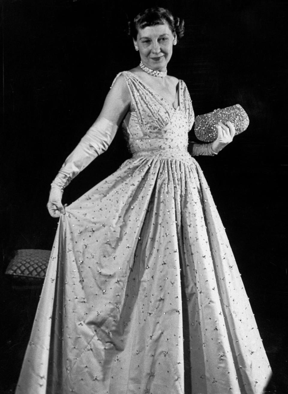 Mamie Eisenhower sported a rose-hued taffeta gown, which was designed by Nettie Rosenstein and featured more than 2,000 hand-embroidered rhinestonesThe LIFE Picture Collection via