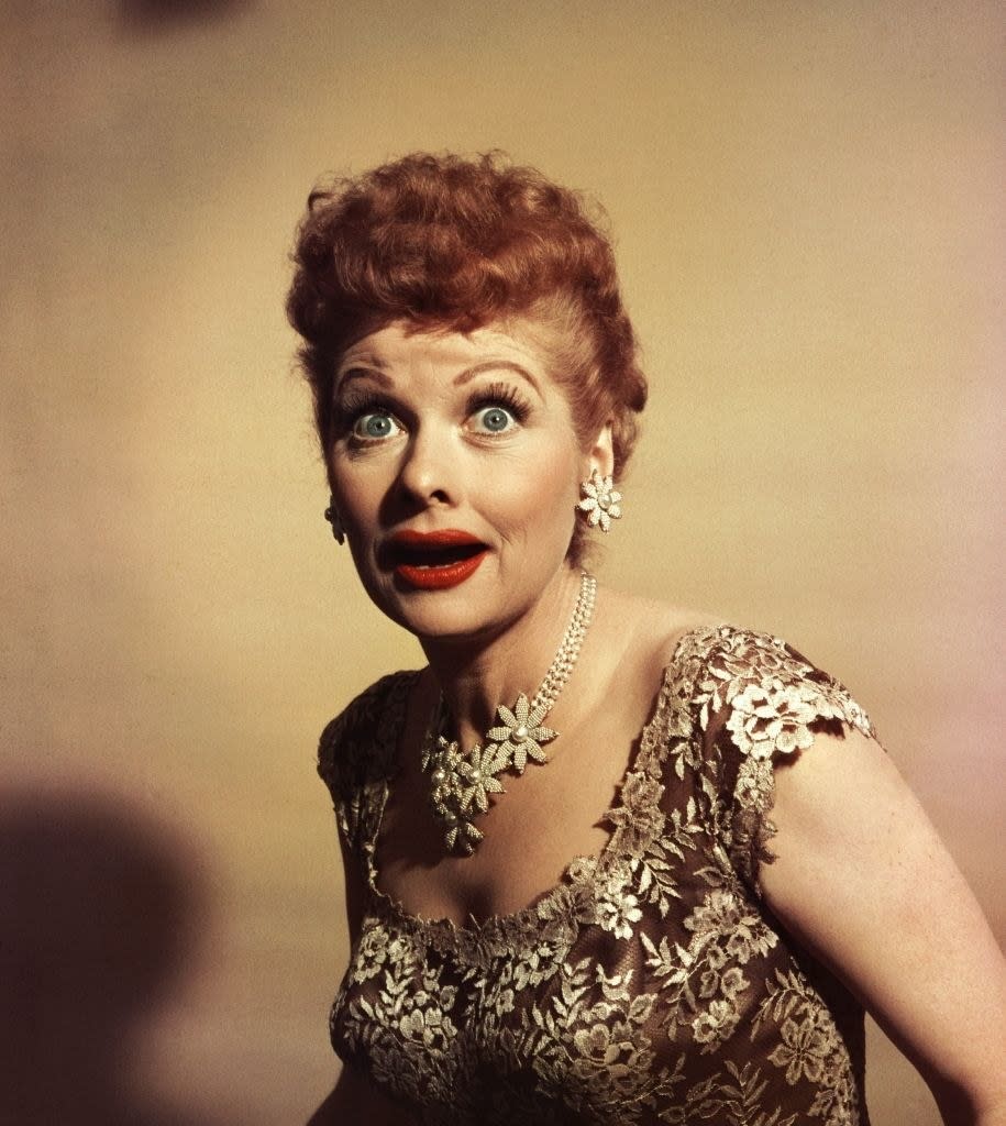 Lucille Ball appearing intentionally startled while posing for a photoshoot