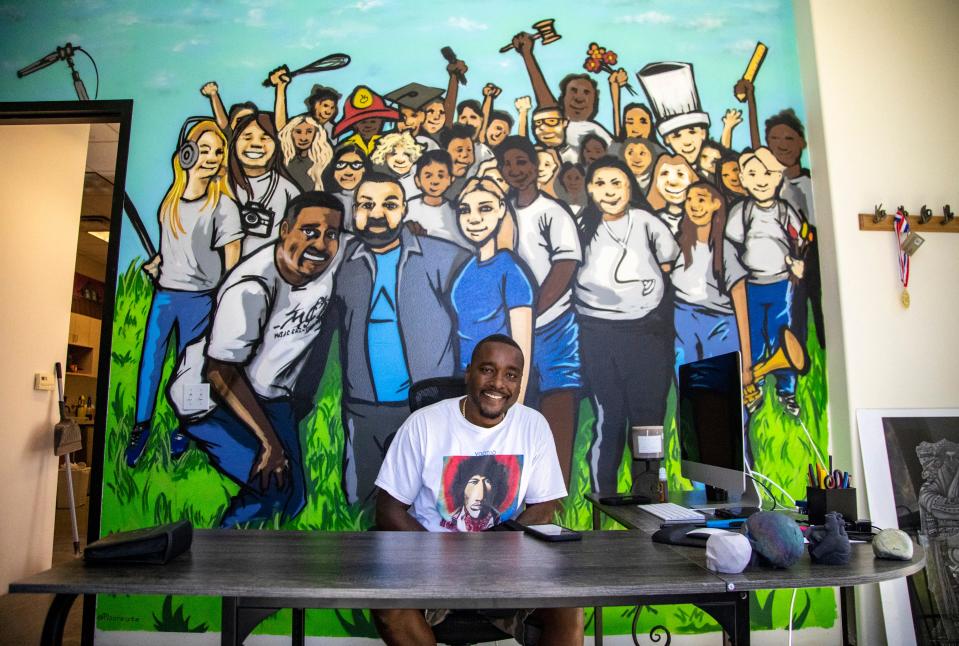 Music Changing Lives founder Josiah Bruny poses for a photo in his office in Thousand Palms, Calif., Thursday, Sept. 22, 2022. 