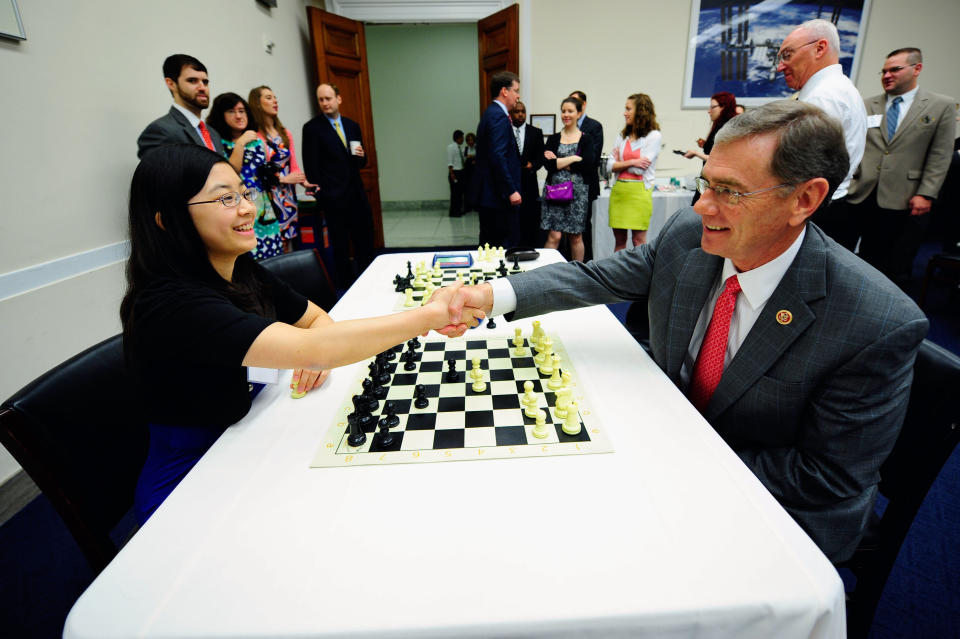 Women's FIDE Master Sarah Chiang (L) shares chess tips with Rep. Blaine Luetkemeyer (R-Mo.) during a special event held at United States Capitol Building on April 18, 2013 in Washington, D.C.  (Photo by Ilya S. Savenok/Getty Images for the Chess Club and Scholastic Center of Saint Louis)