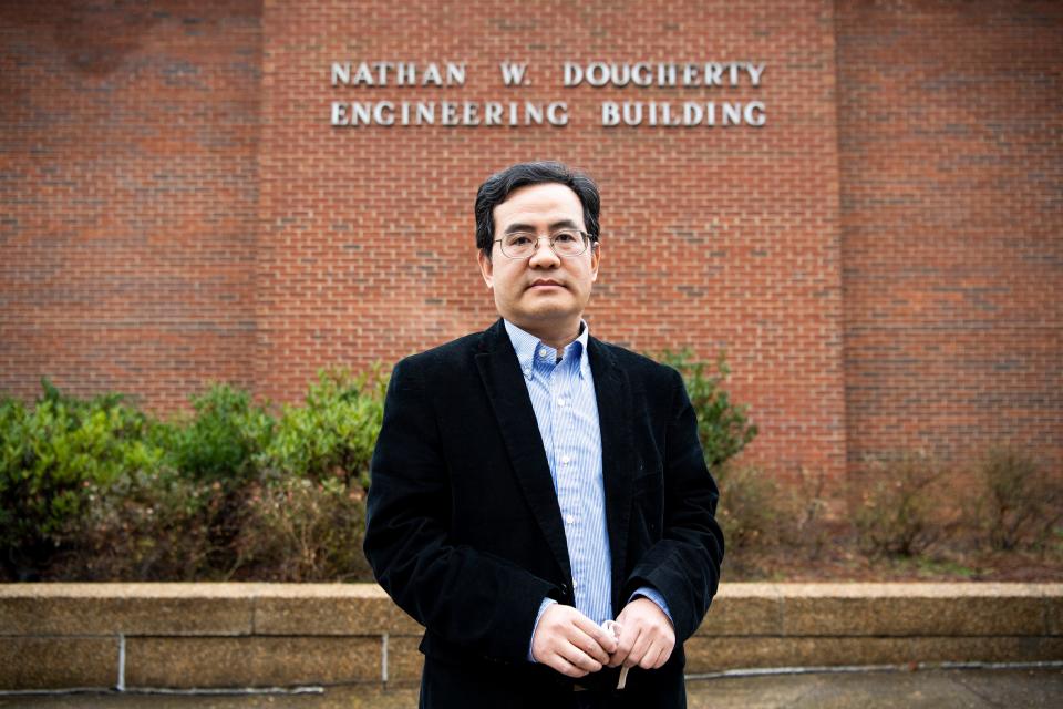 Anming Hu is photographed outside of the Nathan W. Dougherty Engineering Building on the University of Tennessee at Knoxville campus on Friday, Feb. 4, 2022. Hu, a professor, was falsely accused of espionage and later reinstated by UT. 