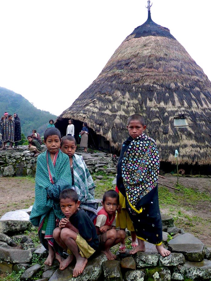 Kids in Wae Rebo village: Now you can visit the village, stay with the locals in their authentic mbaru niang and experience the daily life of the local people. (