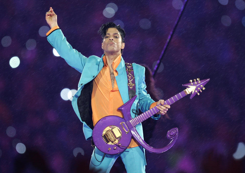 FILE - In this Feb. 4, 2007, file photo, Prince performs during the halftime show at the Super Bowl XLI football game in Miami. "Prince: The Beautiful Ones," the memoir Prince started but didn’t finish before his 2016 death, will be released on Tuesday, Oct. 29, 2019. (AP Photo/Chris O'Meara, File)