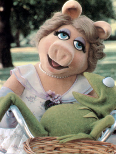 <div class="caption-credit"> Photo by: Universal/Everett Collection</div><div class="caption-title">Miss Piggy, The Great Muppet Caper</div>We love this demanding fashionista's softer side, like the sweetly ruffled picnic dress she wore for a bike ride around a London park with Kermit. With purple piping and a precious floral print, Miss Piggy's soft curls added another dimension to her demure look - complete with wicker bike basket. How could a frog resist? <br> <br> <a rel="nofollow noopener" href="http://www.marieclaire.com/fashion/trends/what-men-think-about-fall-fashion-trends?link=rel&dom=yah_life&src=syn&con=blog_marieclaire&mag=mar" target="_blank" data-ylk="slk:Find out what men really think about Fall fashion trends;elm:context_link;itc:0;sec:content-canvas" class="link ">Find out what men really think about Fall fashion trends</a> <br>