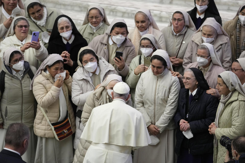 Pope Francis greets a group of nuns during his weekly general audience at the Vatican, Wednesday, Jan. 19, 2022. (AP Photo/Andrew Medichini)