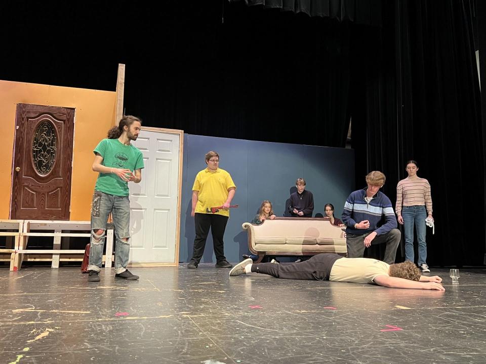 A scene from Monroe High School's "Clue: On Stage (High School Edition)" is shown. The show will run Friday through Sunday.