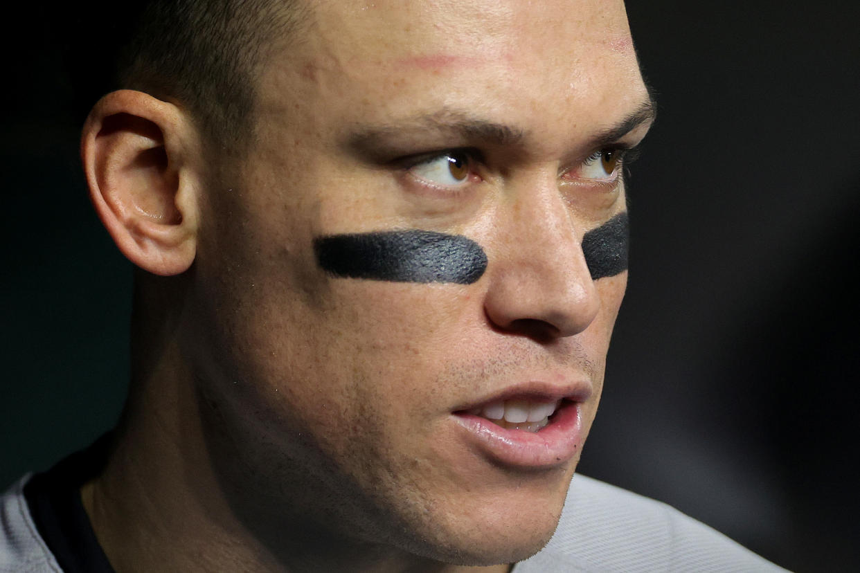 HOUSTON, TEXAS - OCTOBER 20: Aaron Judge #99 of the New York Yankees looks on from the dugout against the Houston Astros during the sixth inning in game two of the American League Championship Series at Minute Maid Park on October 20, 2022 in Houston, Texas. (Photo by Carmen Mandato/Getty Images)