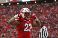 Wisconsin running back Jonathan Taylor celebrates a touchdown against Michigan State during the second half of an NCAA college football game Saturday, Oct. 12, 2019, in Madison, Wis. Wisconsin won 38-0. (AP Photo/Andy Manis)