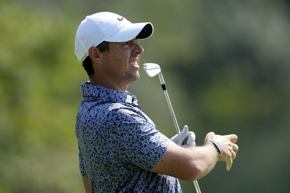 Rory McIlroy of Northern Ireland follows his ball on the 9th hole during the final round of the Dubai Desert Classic, in Dubai, United Arab Emirates, Monday, Jan. 30, 2023. (AP Photo/Kamran Jebreili)