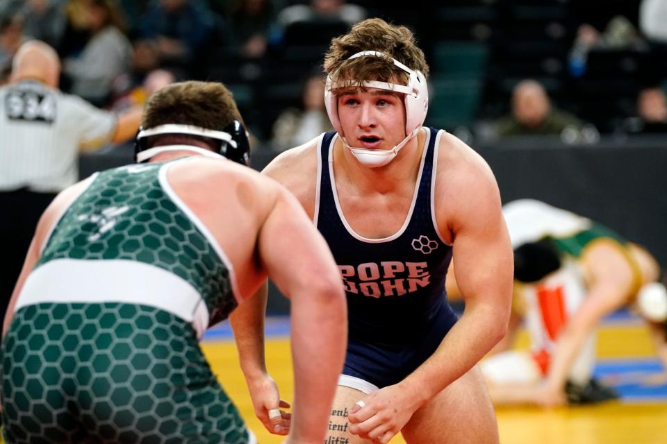 Jack Stoll of Pope John XXIII, right, and P.J. Casale of Passaic Valley wrestle in a 215-pound bout on Day 2 of the NJSIAA state wrestling championships in Atlantic City on Thursday, March 4, 2022.