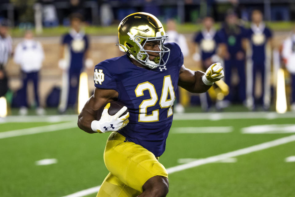 Notre Dame running back Jadarian Price returns a kickoff for a touchdown during the second half of an NCAA college football game against Southern California Saturday, Oct. 14, 2023, in South Bend, Ind. (AP Photo/Michael Caterina)