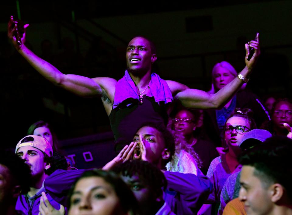 I. J. Bapeli raises his arms in frustration at at an official's call during a watch party in Moody Coliseum for the NCAA Tournament game in Florida between Abilene Christian University and the University of Kentucky in March 2019.