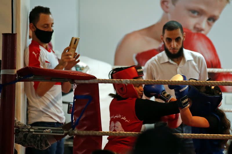 Palestinian girls compete in a rare boxing contest