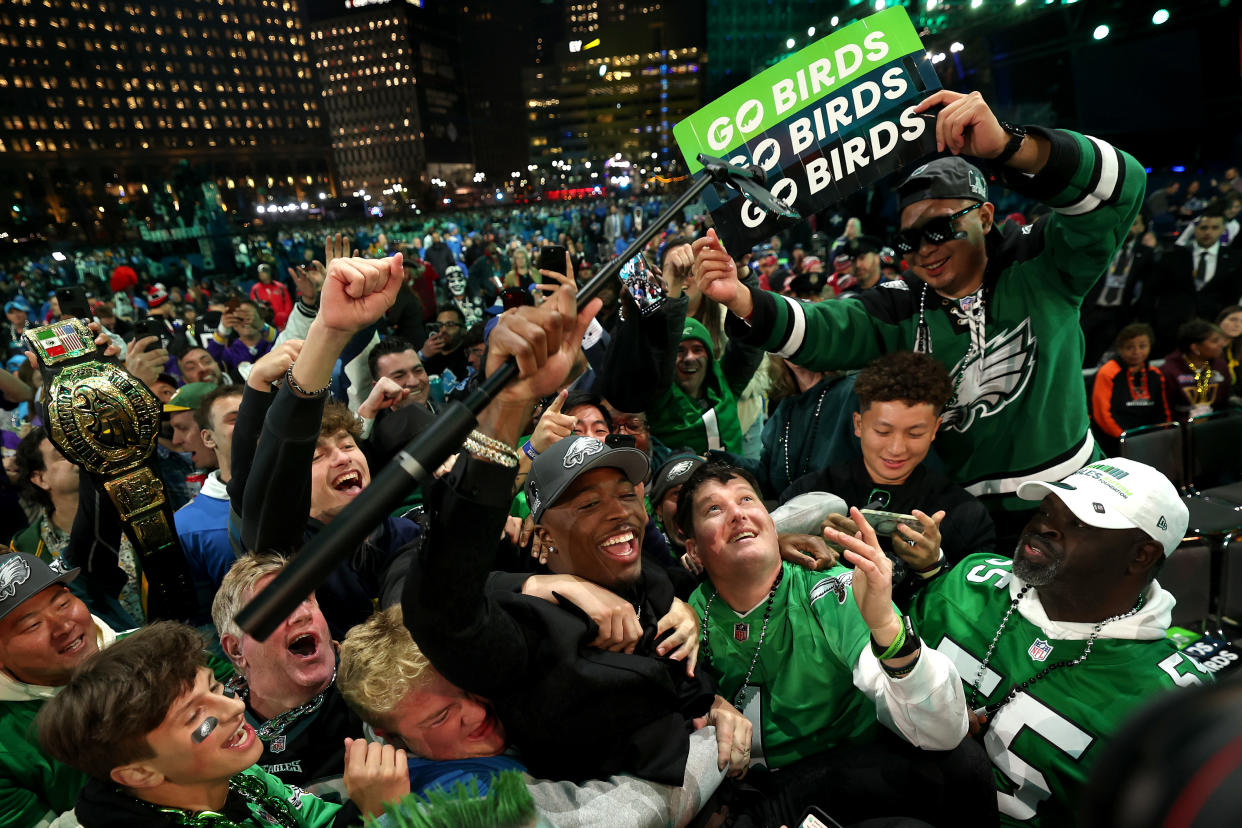 Quinyon Mitchell celebrates with fans after being selected 22nd overall by the Philadelphia Eagles at the NFL Draft on Thursday in Detroit. (Photo by Gregory Shamus/Getty Images)