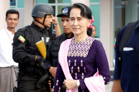 Myanmar's de facto leader Aung San Suu Kyi arrives at Sittwe airport after visiting Maungdaw in the state of Rakhine November 2, 2017. REUTERS/Stringer