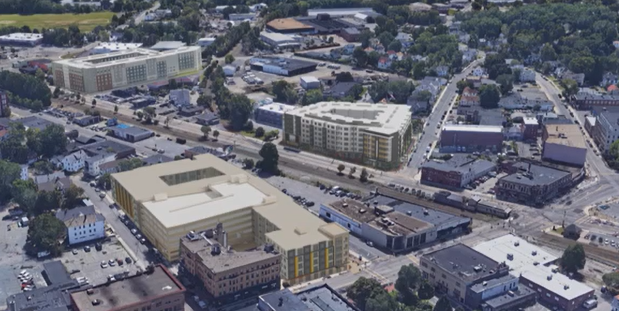A rendering of the proposed building in downtown Framingham. The Boghos development is in the center on the corner of Waverly Street and South Street. The Union House development on Concord Street is at the bottom, across the railroad tracks. Modera Framingham is in the top left, further down Waverly Street.